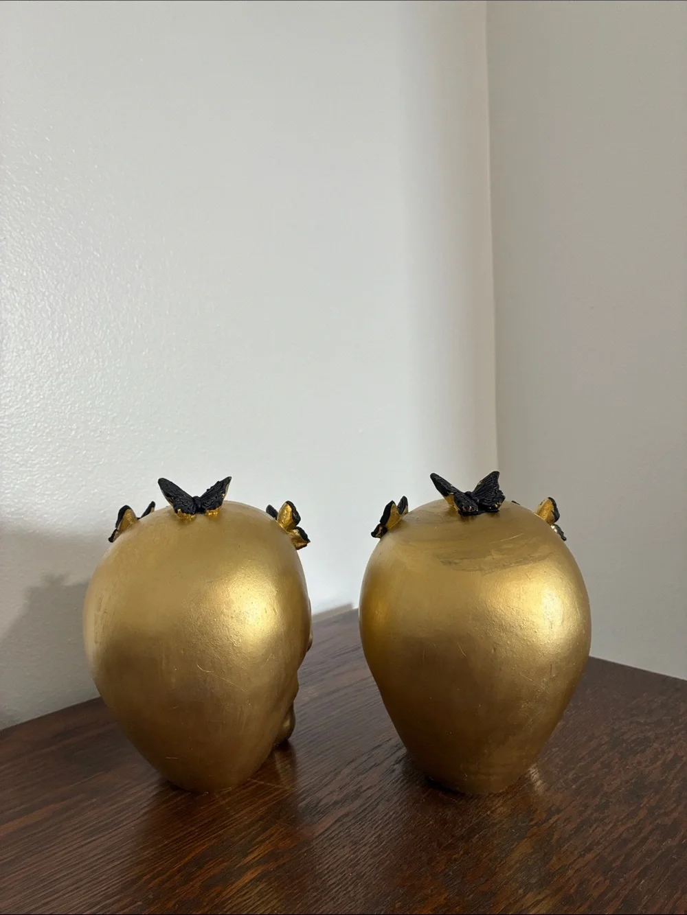 NWT- Set of 2- STUNNING- Gold Skull Statues with Black Butterflies Accents